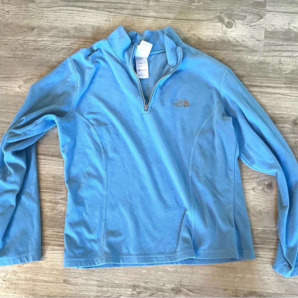 Blue North Face half zip, size medium